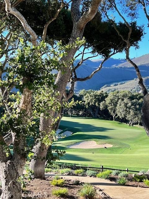 view of community featuring a mountain view and golf course view