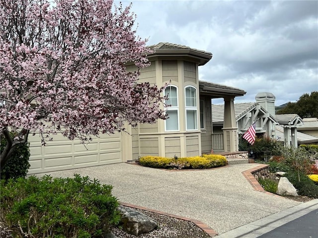 view of front of house featuring a garage and driveway