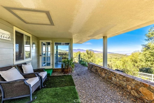 view of patio featuring a mountain view