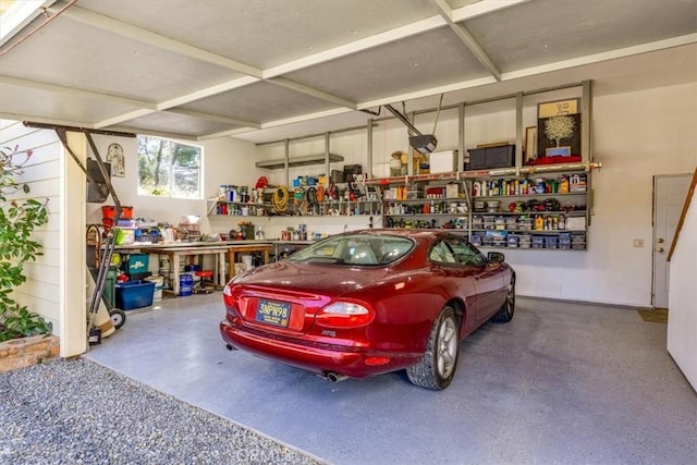 garage with a workshop area