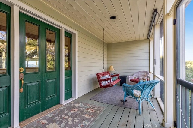 wooden deck featuring a porch