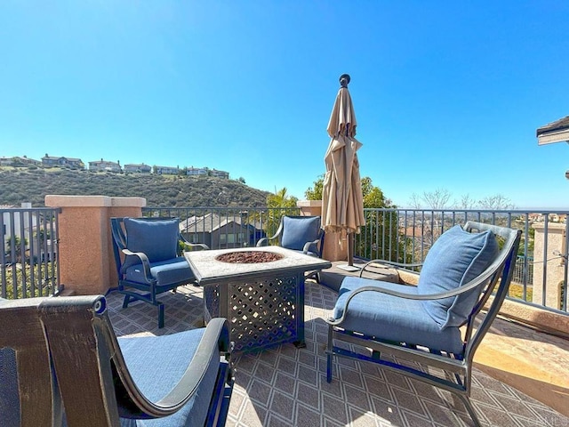 view of patio featuring a fire pit