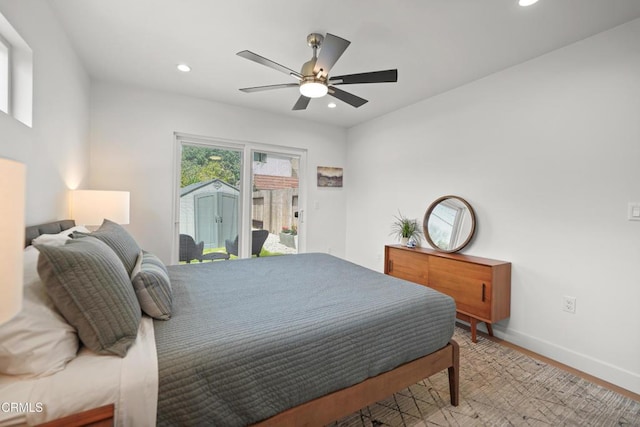 bedroom with access to exterior, recessed lighting, and baseboards