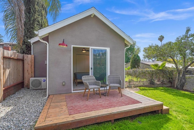 exterior space with ac unit and a fenced backyard