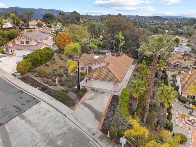 bird's eye view with a mountain view and a residential view