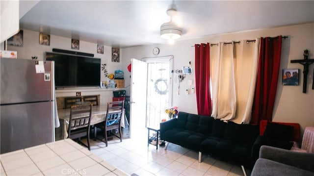 living area featuring light tile patterned floors