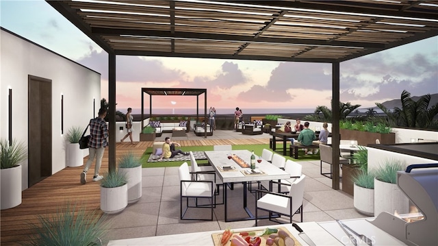 view of patio / terrace with outdoor dining space, a pergola, and an outdoor hangout area