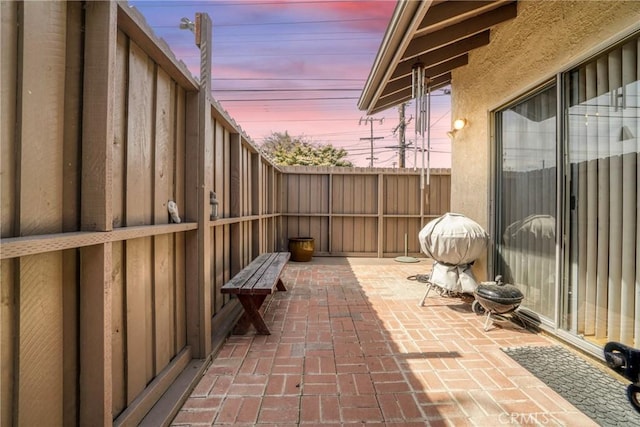 view of patio with fence