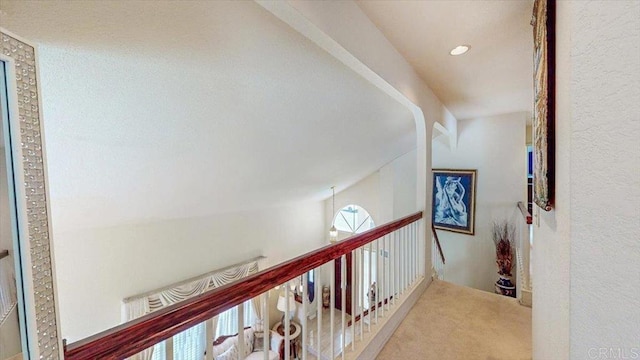 corridor with carpet floors