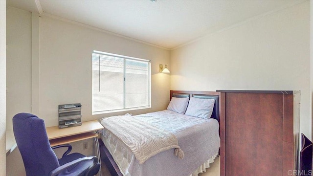 bedroom with ornamental molding