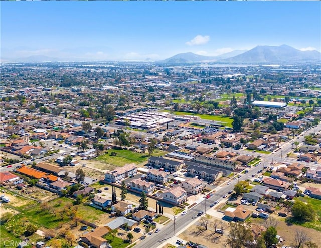 drone / aerial view featuring a mountain view