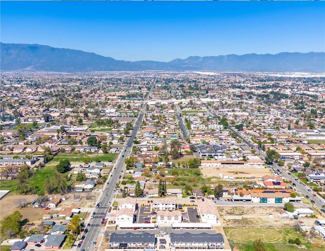 drone / aerial view featuring a mountain view