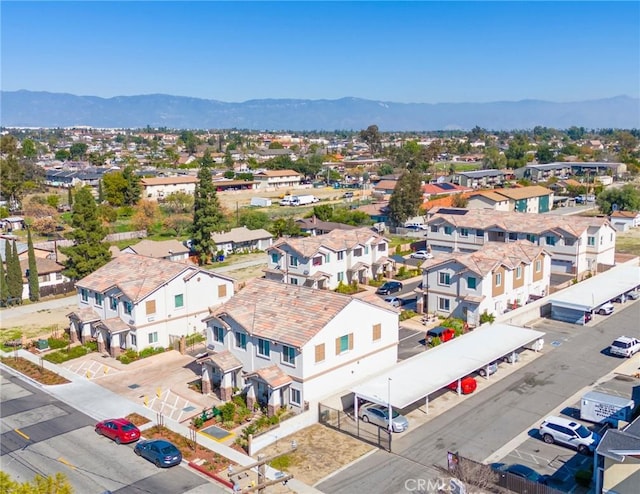 aerial view with a mountain view and a residential view