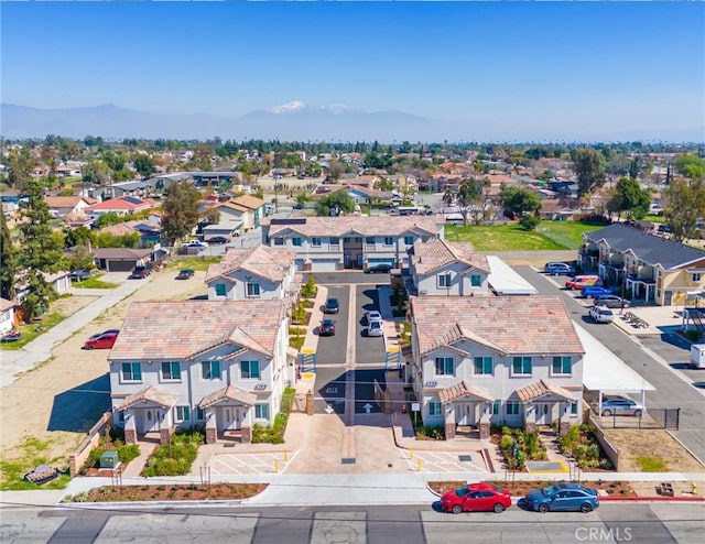 birds eye view of property featuring a residential view and a mountain view