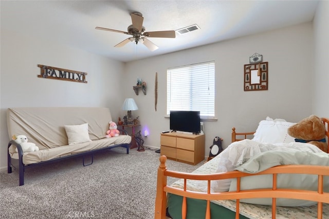 bedroom with a ceiling fan, carpet, visible vents, and baseboards