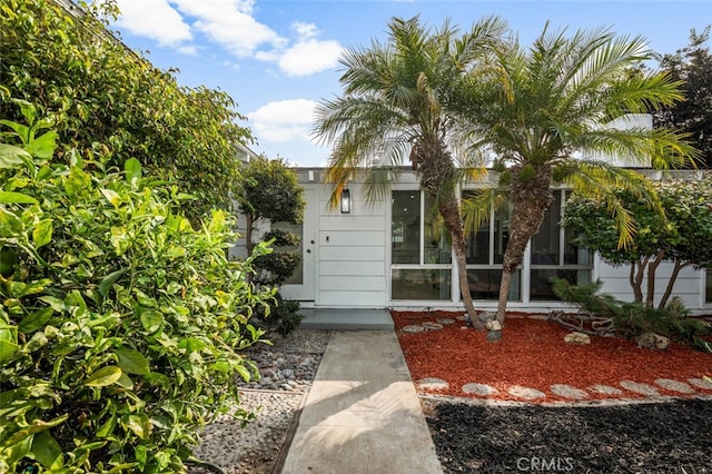 view of front facade featuring a sunroom