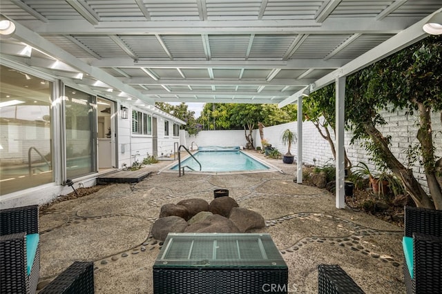 view of swimming pool with a fenced in pool, a patio, and a fenced backyard