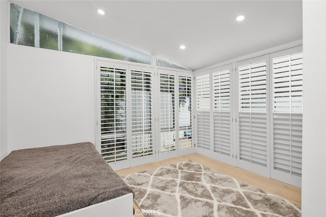 bedroom featuring recessed lighting and lofted ceiling