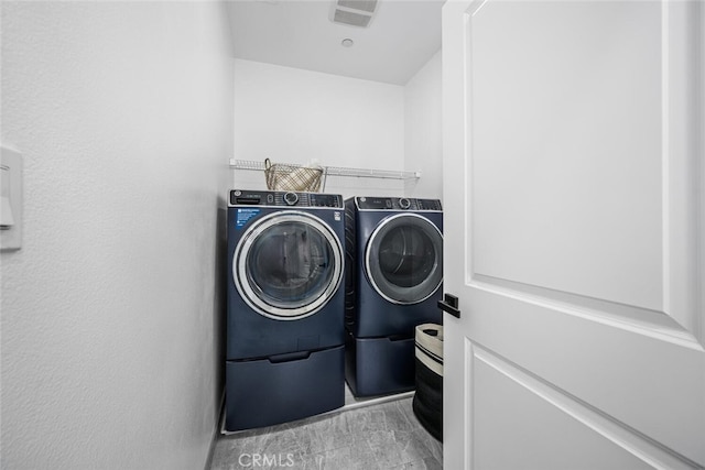 3242 Harmona Pl, Los Alamitos, CA 90720 - laundry area featuring laundry area, visible vents, and washer and clothes dryer