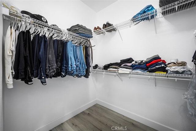 3242 Harmona Pl, Los Alamitos, CA 90720 - spacious closet with wood finished floors