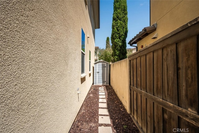 3242 Harmona Pl, Los Alamitos, CA 90720 - view of side of property featuring fence and stucco siding