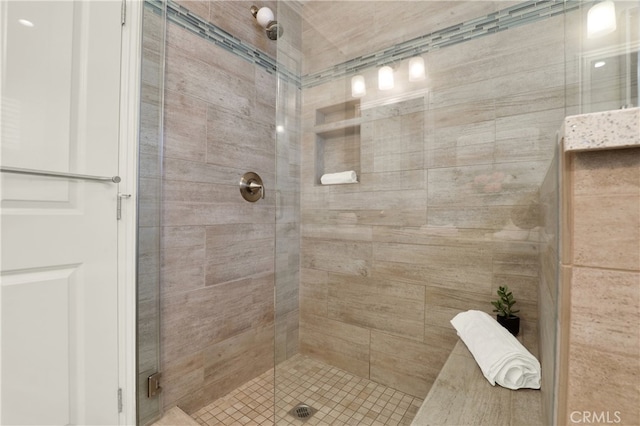 bathroom with a stall shower