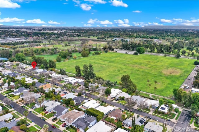 birds eye view of property with a residential view