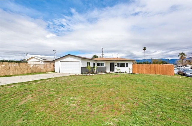 single story home with driveway, a front yard, a garage, and fence