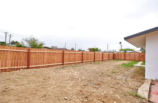 view of yard featuring a fenced backyard