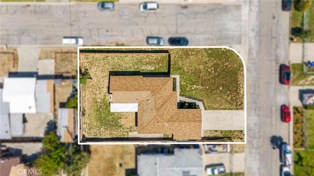 aerial view of property and surrounding area featuring property boundaries highlighted