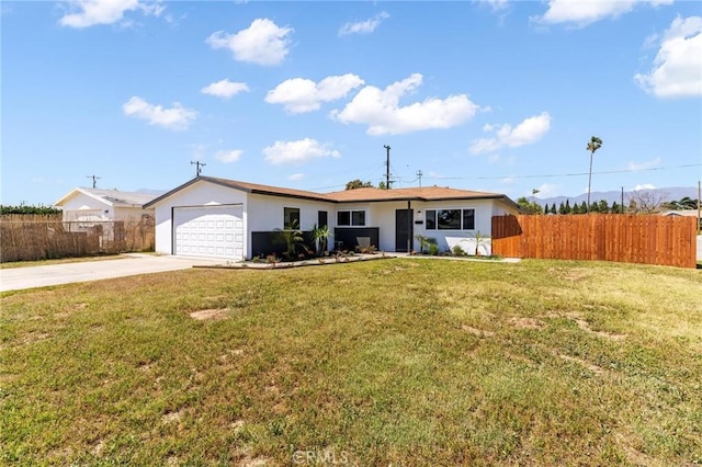 ranch-style home featuring concrete driveway, an attached garage, and stucco siding