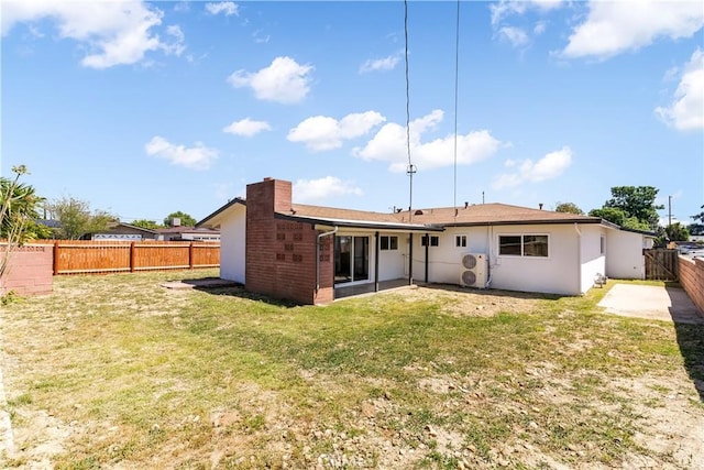 back of property featuring a chimney