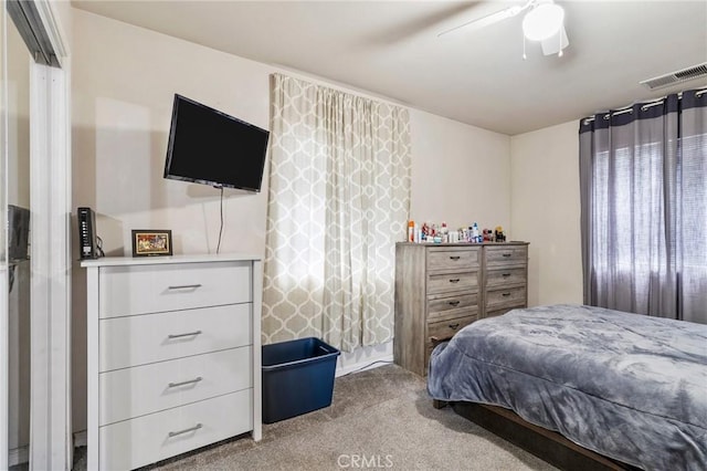 bedroom featuring carpet, visible vents, and ceiling fan