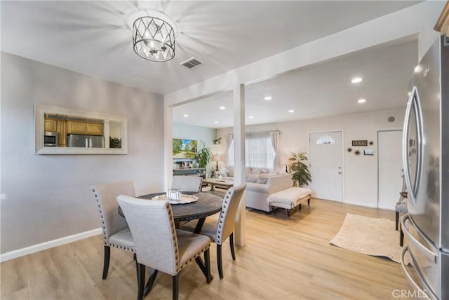 dining area with recessed lighting, visible vents, light wood finished floors, and baseboards