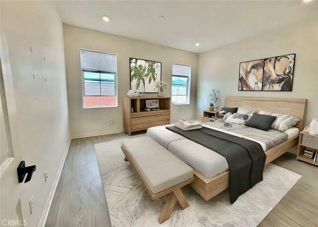 30981 Alister Ln, Winchester, CA 92596 - bedroom with recessed lighting, wood finished floors, and baseboards