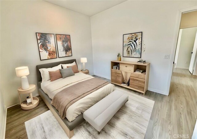 30981 Alister Ln, Winchester, CA 92596 - bedroom featuring light wood-style flooring and baseboards