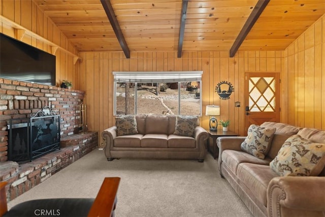 living area with wooden ceiling, lofted ceiling with beams, and carpet