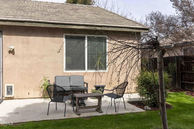 view of patio / terrace with fence