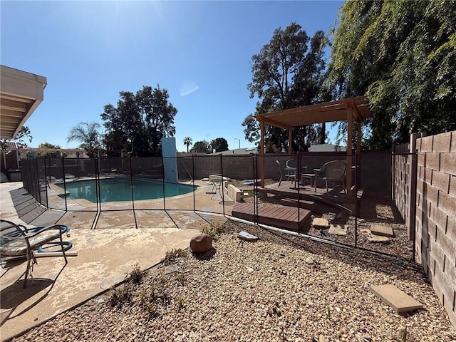 view of pool with a patio area, a fenced in pool, and a fenced backyard