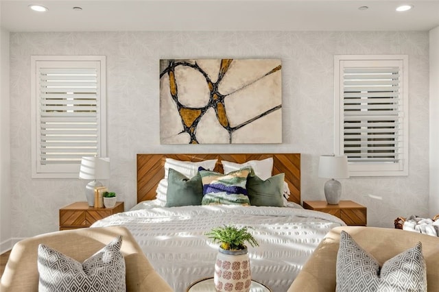 bedroom featuring recessed lighting and wallpapered walls