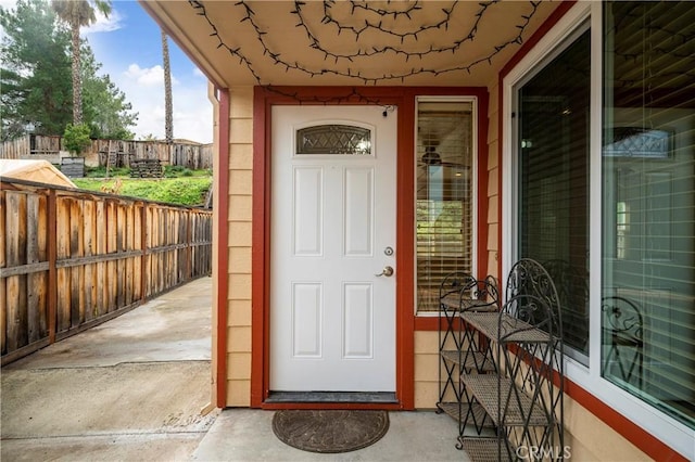 property entrance featuring fence