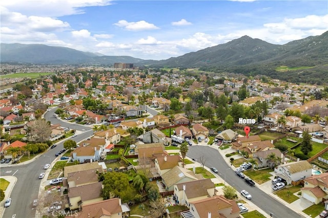 bird's eye view with a mountain view and a residential view