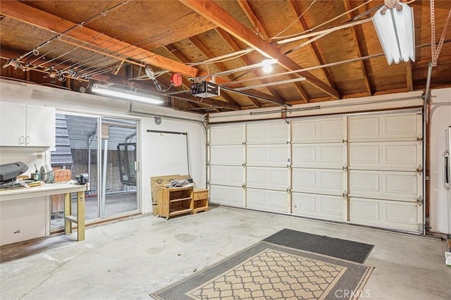 garage featuring a garage door opener