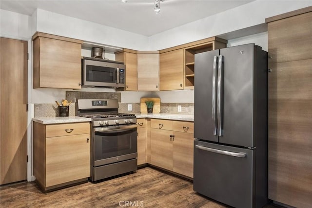 kitchen with light stone countertops, open shelves, light brown cabinetry, stainless steel appliances, and dark wood-type flooring