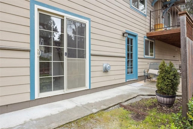 view of property exterior with a balcony