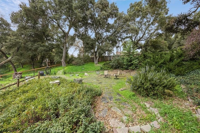 view of yard with fence