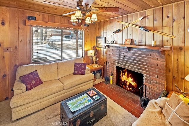 living room featuring a fireplace, wooden walls, wood ceiling, and ceiling fan