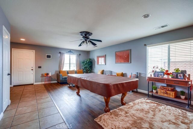 game room featuring visible vents, billiards, light tile patterned floors, baseboards, and ceiling fan