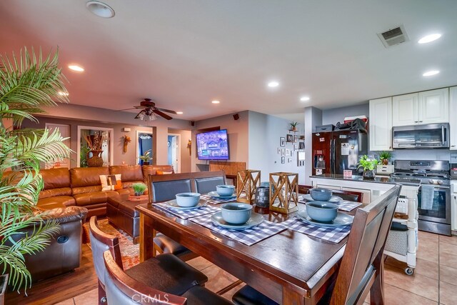 dining space with recessed lighting, visible vents, a ceiling fan, and light tile patterned floors