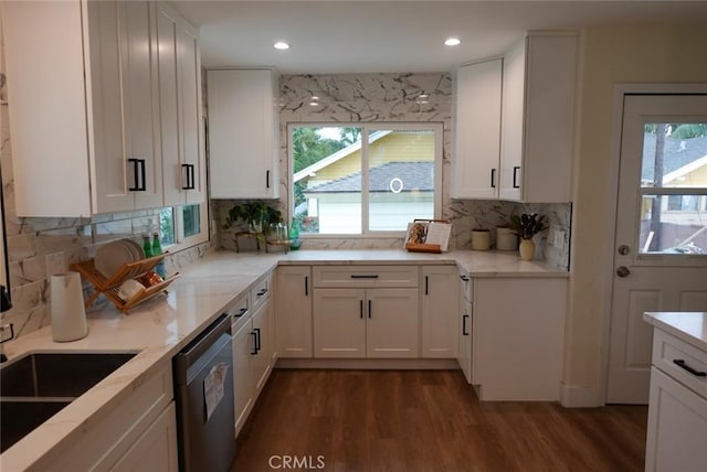 kitchen featuring white cabinets, dishwasher, light stone counters, and dark wood finished floors